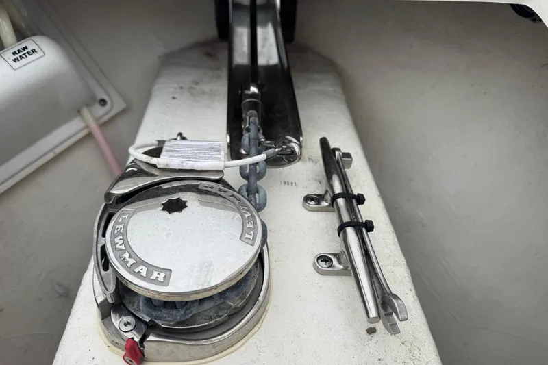 Slide: The Image of 2024 Cobia 240 Dual Console boat anchor system with Lewmar windlass. - 22