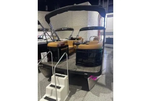 The Image of 2026 Godfrey Sweetwater 2286 SFLC pontoon boat with tan seating and canopy. - 1