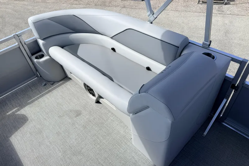 Slide: The Image of 2026 Avalon 2385 Venture 85 Tri Toon boat interior with gray seating and cup holders. - 17