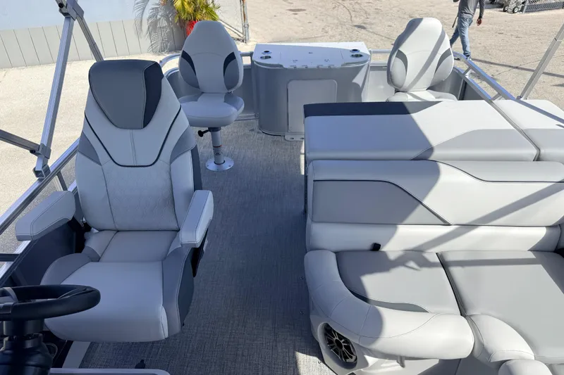 Slide: The Image of Luxurious interior of 2026 Avalon 2385 Venture 85 Tri Toon boat with plush seating. - 20