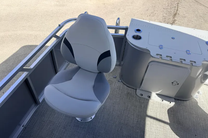 Slide: The Image of 2026 Avalon 2385 Venture 85 Tri Toon boat interior with fishing seat and console. - 24