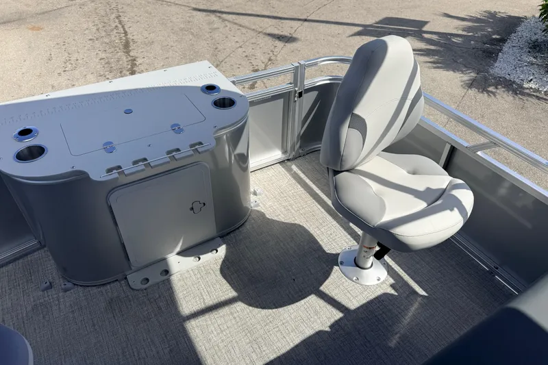 Slide: The Image of 2026 Avalon 2385 Venture 85 Tri Toon boat interior with fishing seat and console. - 25