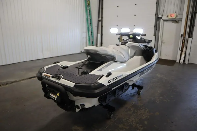 Slide: The Image of 2026 Sea-Doo GTX Limited 325 jet ski in a garage setting. - 5
