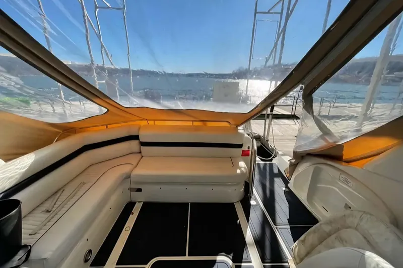 Slide: The Image of Luxurious interior of a 2004 Sunseeker Predator 56 yacht with scenic water views. - 12