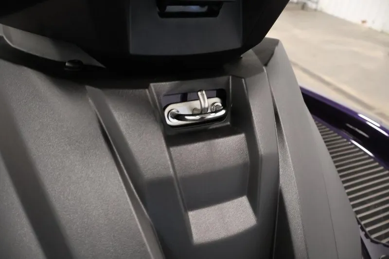 Slide: The Image of 2025 Yamaha WaveRunner VX Cruiser close-up of sleek black body and metal latch. - 18