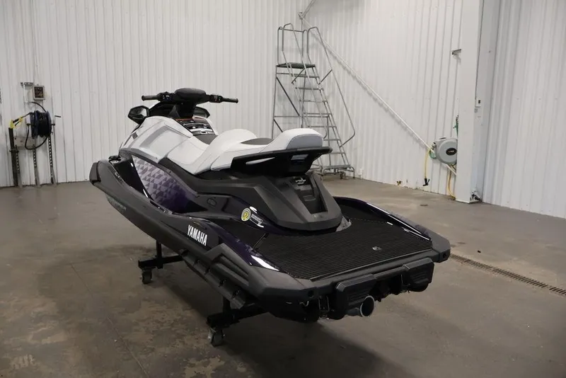 Slide: The Image of 2025 Yamaha WaveRunner VX Cruiser in a garage, showcasing sleek design and modern features. - 9