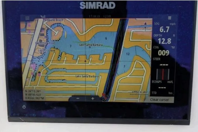 Slide: The Image of Simrad navigation display on 2016 Southport 272 TE, showing Lake Santa Barbara map. - 2