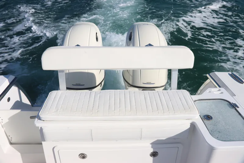 Slide: The Image of 2016 Southport 272 TE boat with twin outboard motors on the open sea. - 22