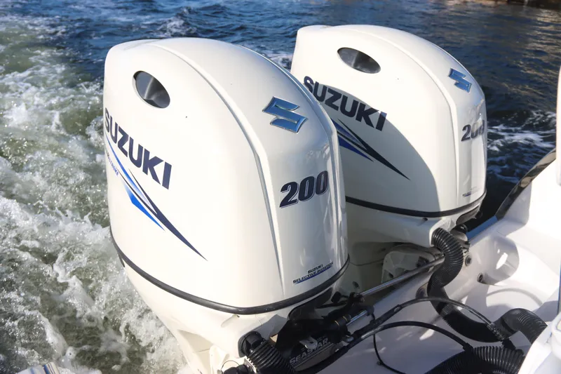 Slide: The Image of Twin Suzuki 200 outboard engines on a 2016 Southport 272 TE boat. - 31