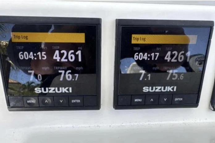 Slide: The Image of Dual Suzuki trip log displays on 2016 Southport 272 TE boat dashboard. - 4