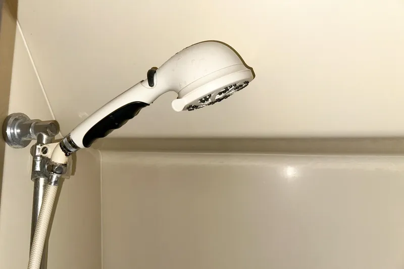 Slide: The Image of Showerhead in 1986 Sea Ray 390 Express Cruiser bathroom. - 50