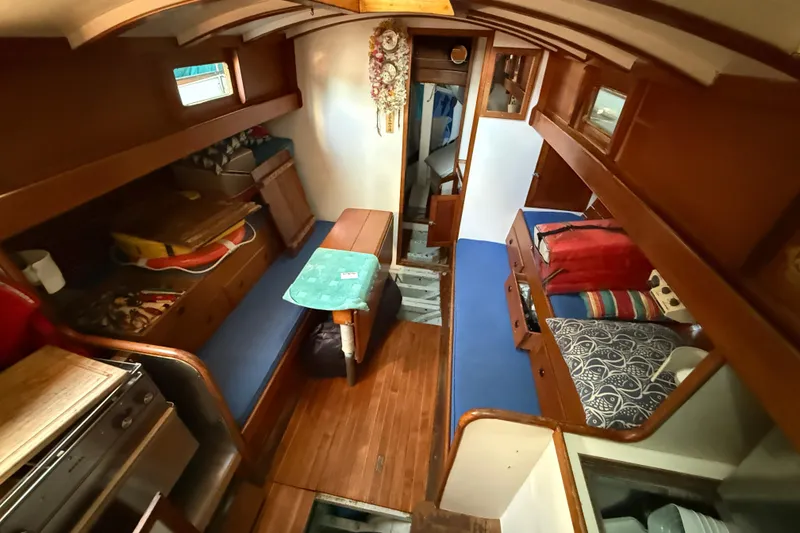 Slide: The Image of Vintage 1965 sailboat "Seeker" docked in Long Beach marina with inflatable dinghy. - 3