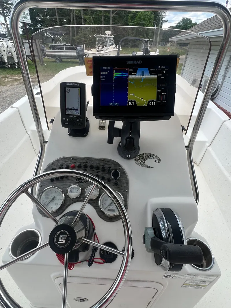 Slide: The Image of 2015 Carolina Skiff 218 DLV helm with navigation system. - 11