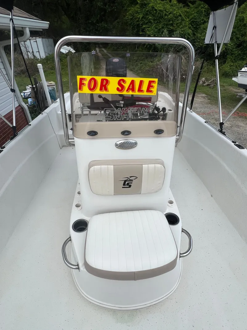 Slide: The Image of 2015 Carolina Skiff 218 DLV boat with "For Sale" sign. - 17