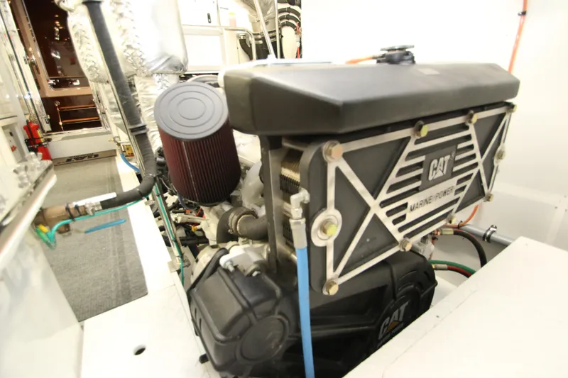 Slide: The Image of Engine room of 2015 Hargrave 76 yacht featuring CAT marine power engine. - 10