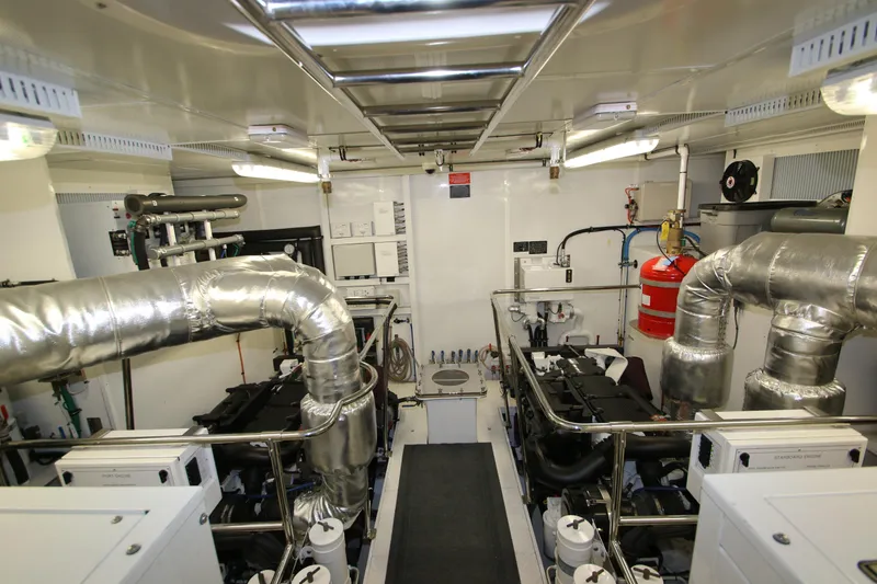 Slide: The Image of Engine room of 2015 Hargrave 76 yacht with insulated pipes and machinery. - 13