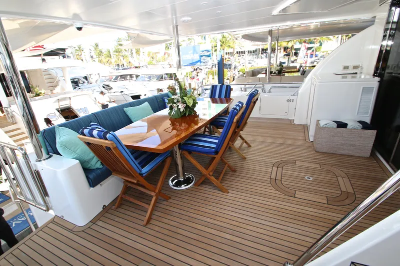 Slide: The Image of Luxurious 2015 Hargrave 76 yacht deck with elegant seating and dining area. - 21
