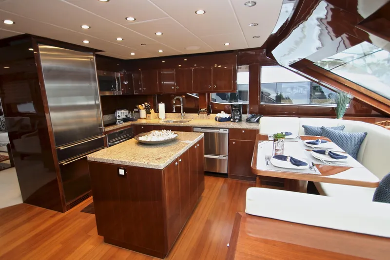 Slide: The Image of Luxurious kitchen interior of 2015 Hargrave 76 yacht with elegant wood finishes. - 41