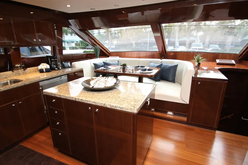 Slide: The Image of Luxurious interior of 2015 Hargrave 76 yacht with elegant dining area and modern kitchen. - 42