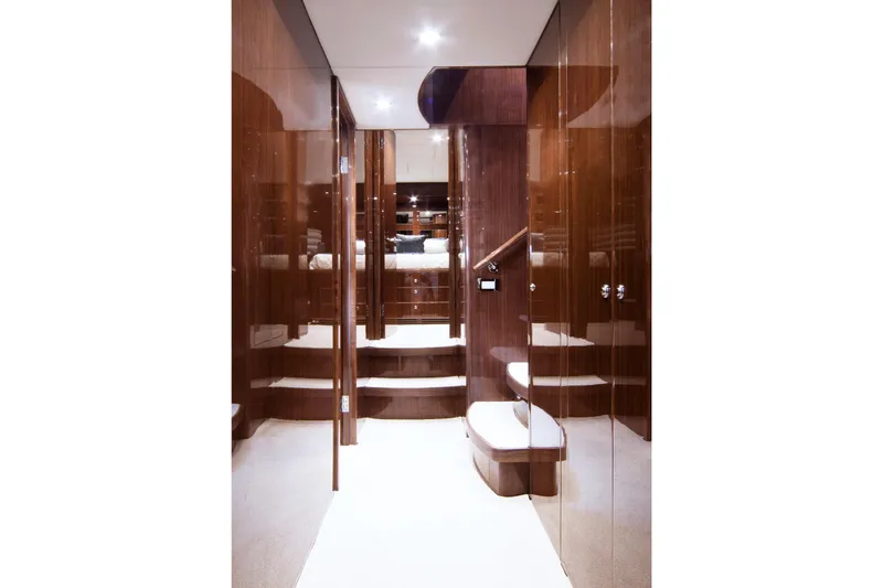 Slide: The Image of Luxurious interior of 2015 Hargrave 76 yacht with polished wood and elegant design. - 47