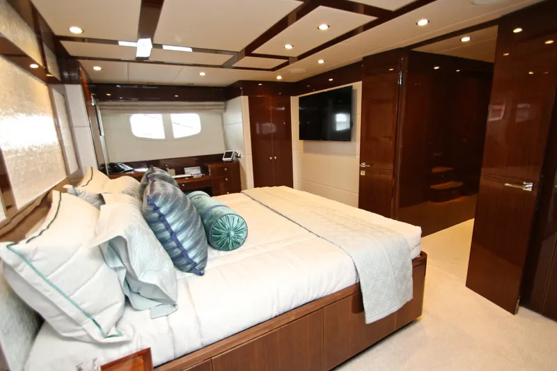 Slide: The Image of Luxurious bedroom interior of 2015 Hargrave 76 yacht with elegant wood finishes. - 49