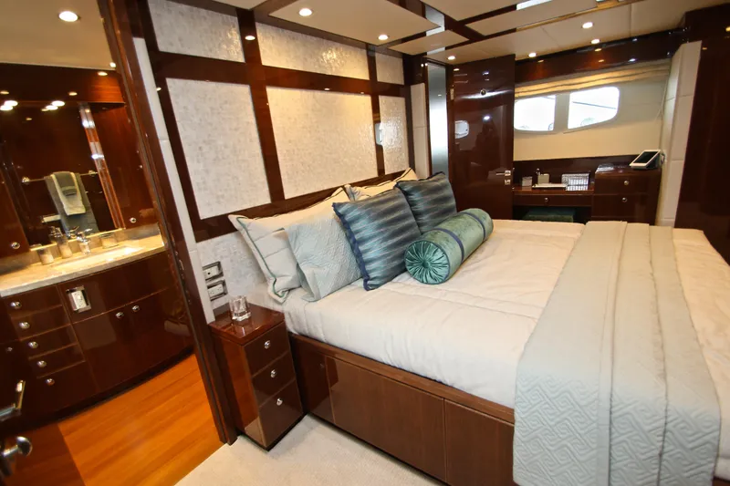 Slide: The Image of Luxurious bedroom interior of 2015 Hargrave 76 yacht with elegant wood finishes. - 50