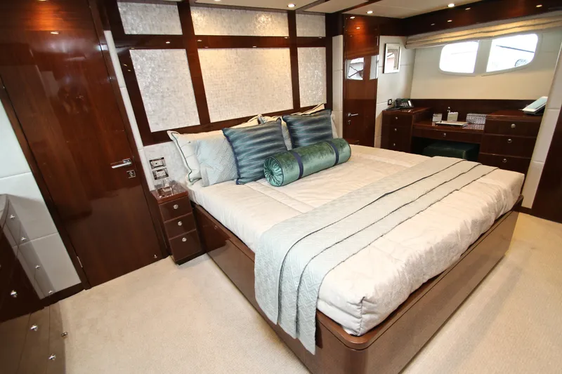 Slide: The Image of Luxurious bedroom interior of 2015 Hargrave 76 yacht with elegant wood finishes. - 57