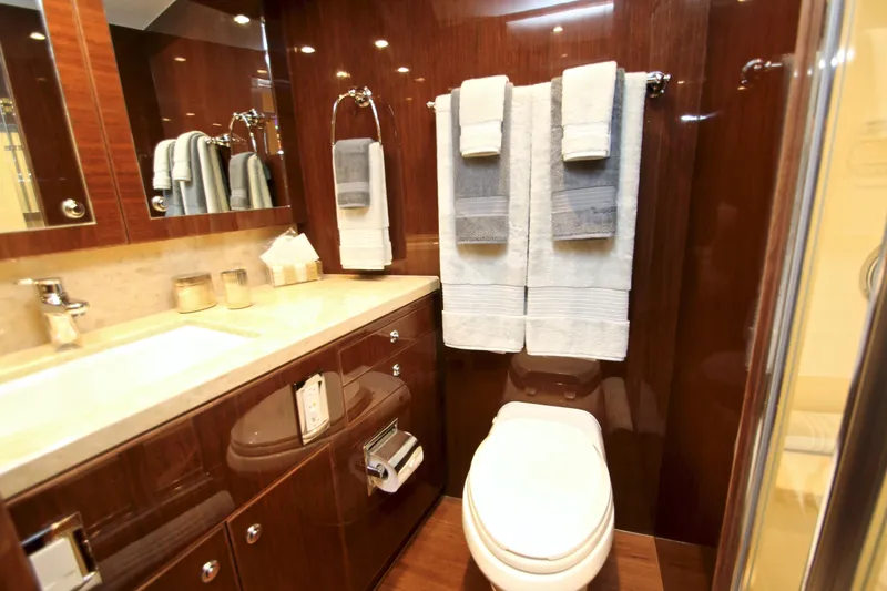 Slide: The Image of Luxurious bathroom in 2015 Hargrave 76 yacht with elegant wood finishes and modern amenities. - 62