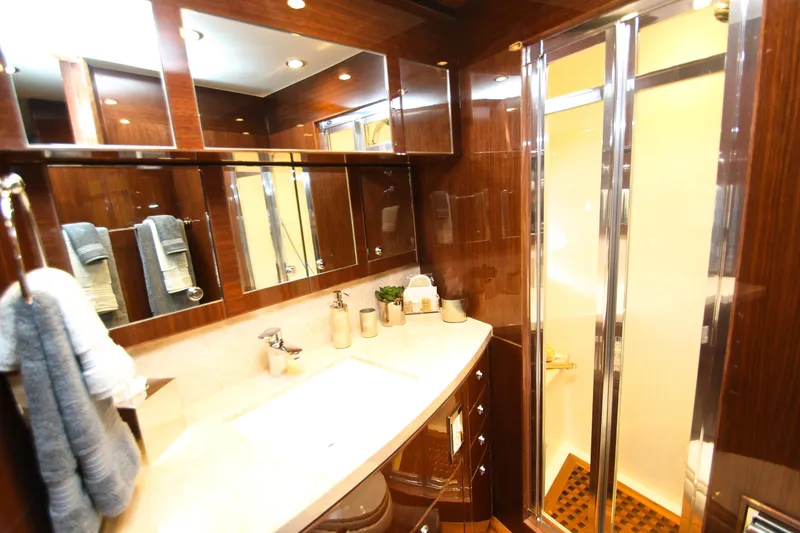 Slide: The Image of Luxurious bathroom in 2015 Hargrave 76 yacht with elegant wood finishes and modern fixtures. - 65
