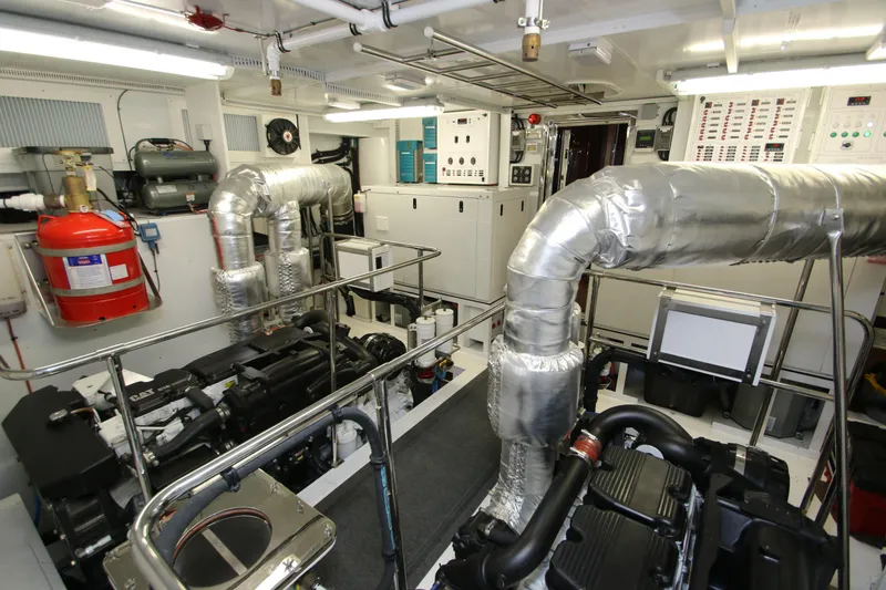Slide: The Image of Engine room of 2015 Hargrave 76 yacht, featuring advanced machinery and equipment. - 7