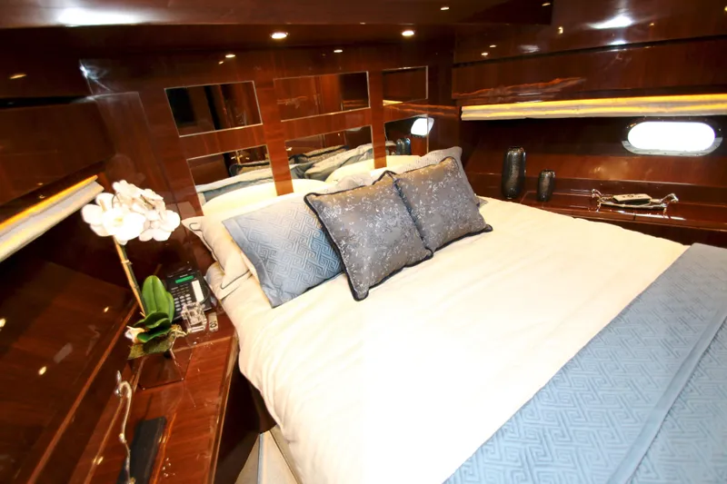 Slide: The Image of Luxurious bedroom interior of 2015 Hargrave 76 yacht with elegant decor and bedding. - 70