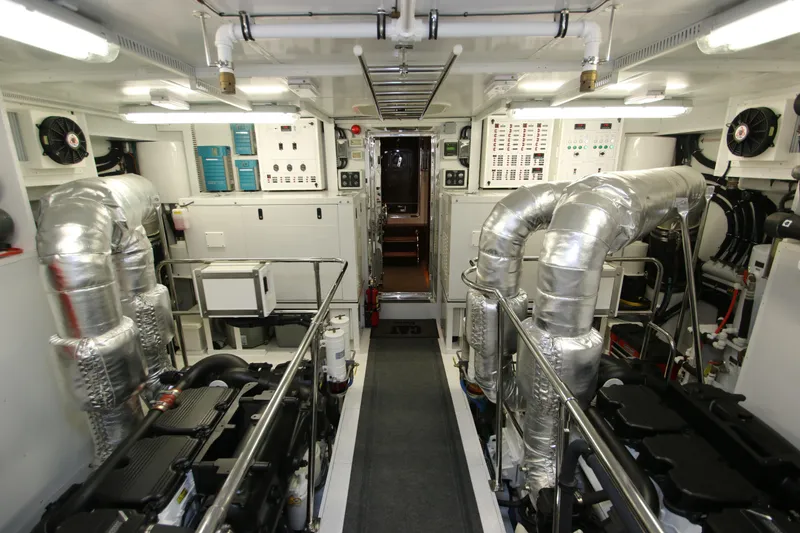 Slide: The Image of Engine room of 2015 Hargrave 76 yacht, featuring advanced machinery and equipment. - 8