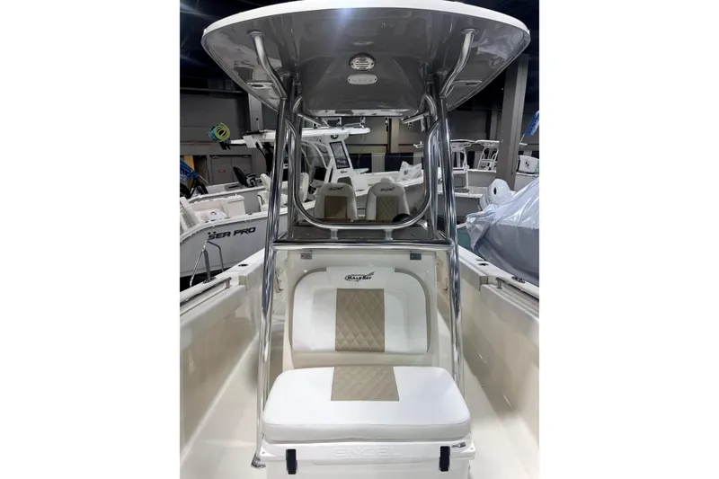 Slide: The Image of 2024 Bulls Bay 255 Center Console boat interior with seating and T-top. - 7