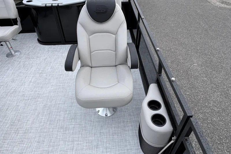 Slide: The Image of Luxury seating on 2026 Dockside 20DF boat with cup holders and sleek design. - 11
