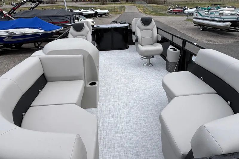Slide: The Image of 2026 Dockside 20DF pontoon boat interior with plush seating and modern design. - 5