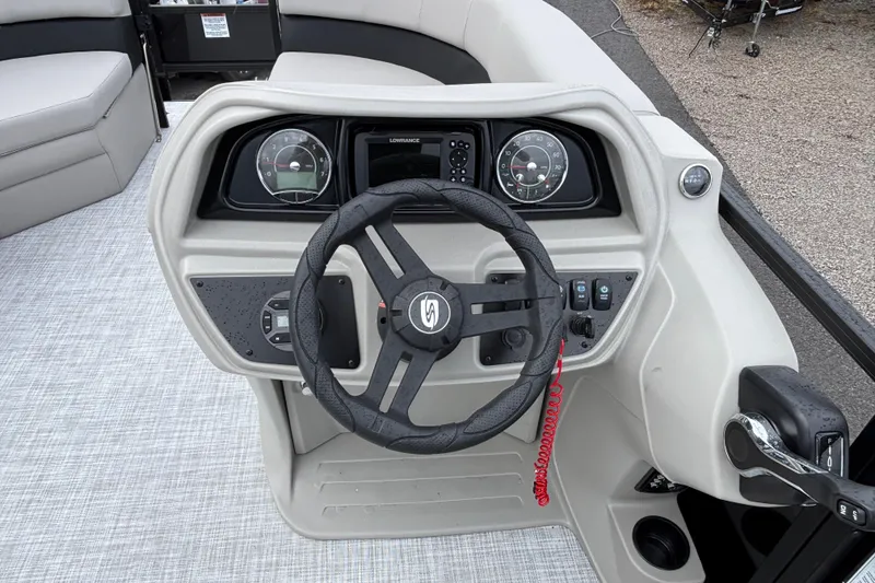 Slide: The Image of 2026 Dockside 20DF boat dashboard with steering wheel and control panel. - 7
