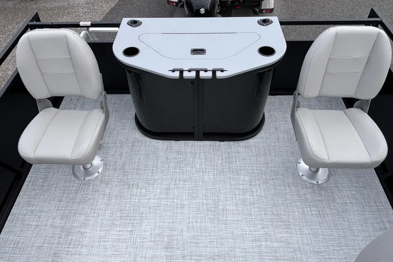Slide: The Image of Two white seats and a console on a 2026 Dockside 20DF boat deck. - 9