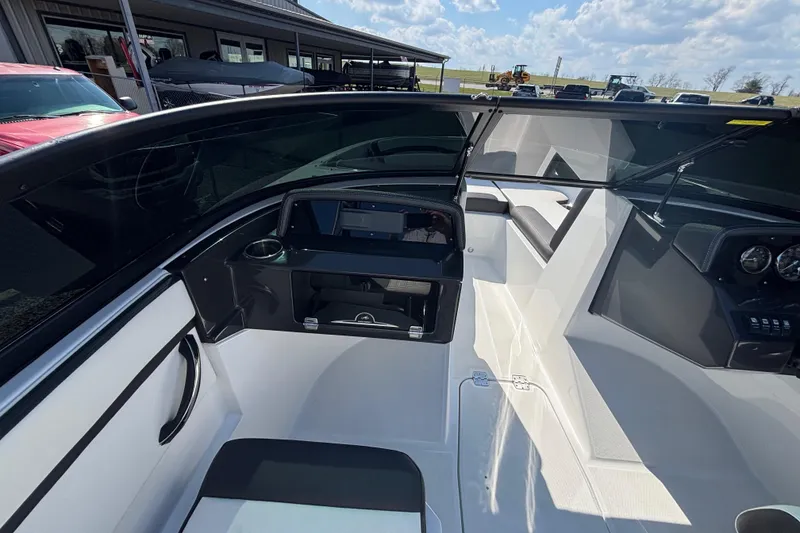 Slide: The Image of 2021 Monterey M-22 boat interior with sleek design and modern dashboard. - 10