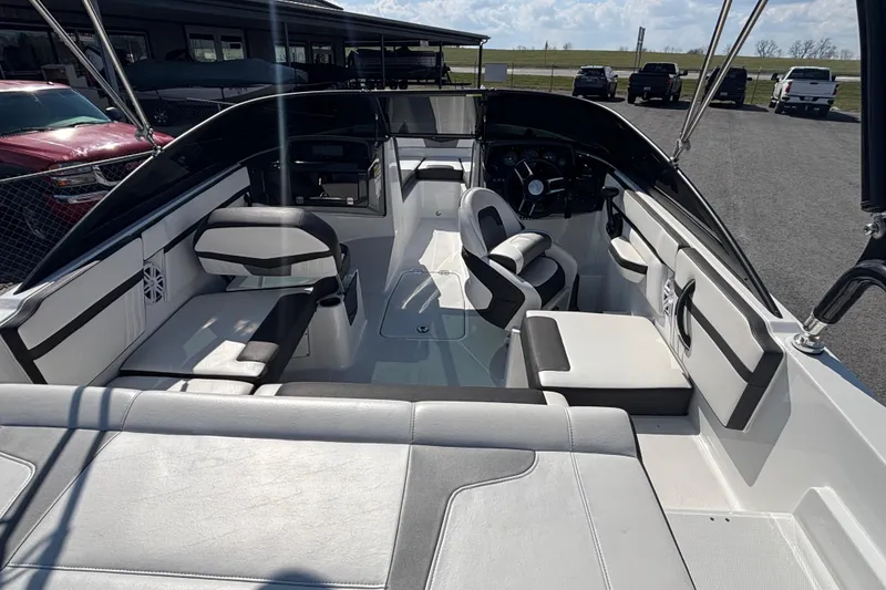 Slide: The Image of 2021 Monterey M-22 boat interior with modern seating and steering wheel. - 5