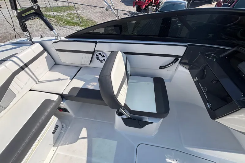 Slide: The Image of 2021 Monterey M-22 boat interior with sleek seating and modern design. - 6