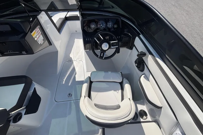 Slide: The Image of Cockpit of 2021 Monterey M-22 boat with steering wheel and seating. - 8