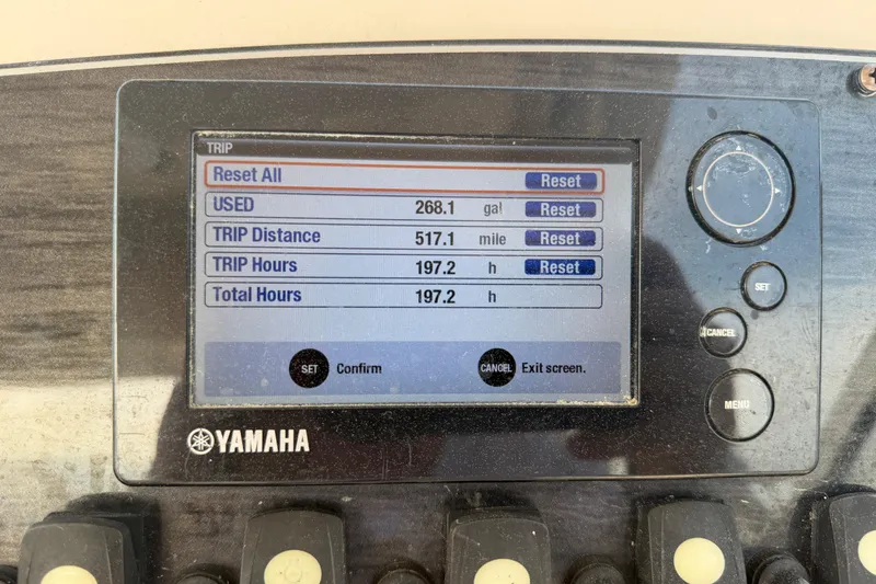 Slide: The Image of Yamaha boat display showing trip data: 268.1 gallons used, 517.1 miles, 197.2 hours. Grady-White Freedom 225, 2017. - 19