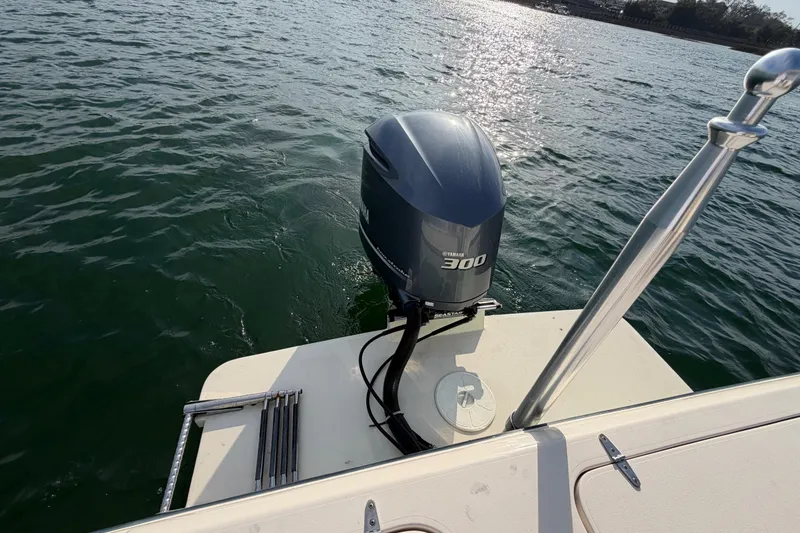 Slide: The Image of 2017 Grady-White Freedom 225 boat with Yamaha 300 outboard motor on water. - 33