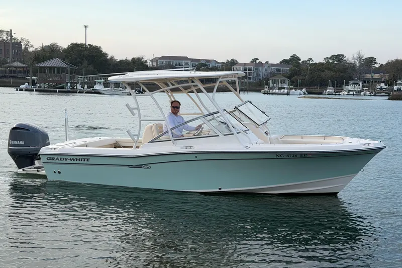 Slide: The Image of 2017 Grady-White Freedom 225 boat on water, featuring Yamaha outboard motor. - 7