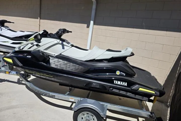Slide: The Image of 2026 Yamaha WaveRunner VX Cruiser HO on trailer, sleek black and white design. - 3