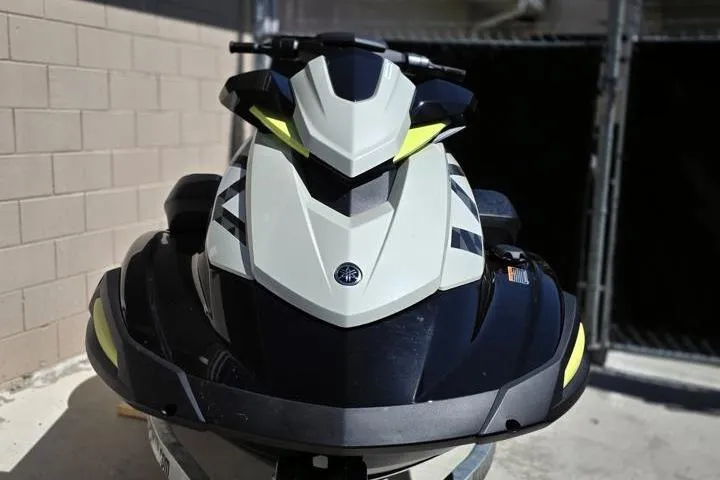 Slide: The Image of 2026 Yamaha WaveRunner VX Cruiser HO, sleek design, front view, parked outdoors. - 6