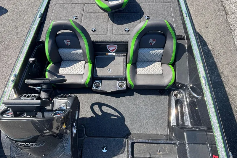 Slide: The Image of 2020 Triton 189 TrX boat interior with dual seats and steering console. - 10