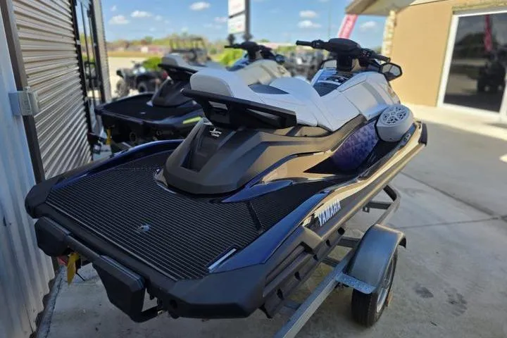 Slide: The Image of 2026 Yamaha WaveRunner VX Cruiser HO on trailer, parked outdoors under clear sky. - 4