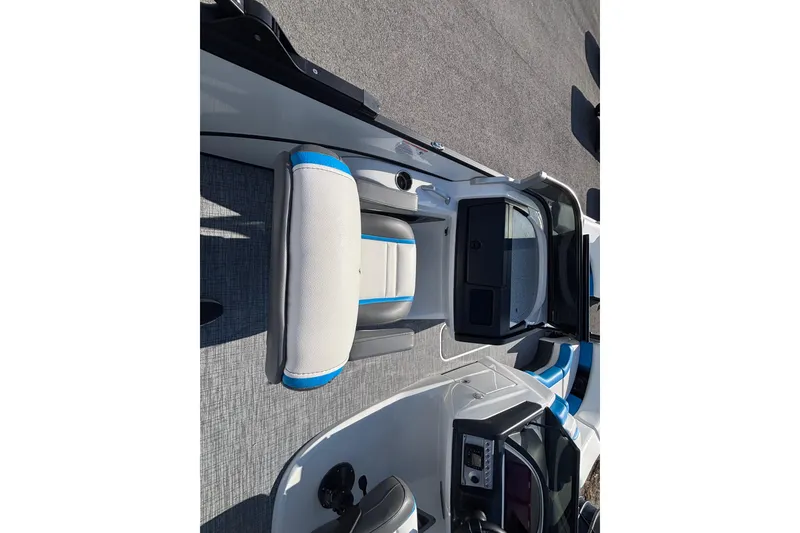 Slide: The Image of 2025 Berkshire 25UL DC STS boat interior with modern seating and sleek design. - 7