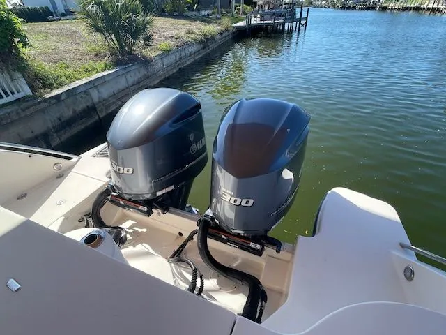 Slide: The Image of Two Yamaha 300 outboard engines on a Grady-White 325 Freedom boat. - 10